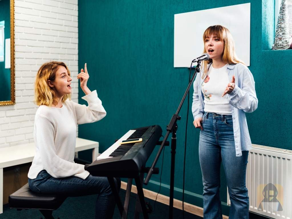 Singer Working With A Vocal Coach